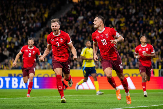 Silvan Widmer and Granit Xhaka of Switzerland celebrating