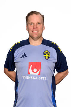 Assistant coach Viktor Eriksson poses for a portrait