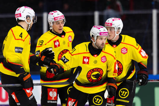 Emil Bemström of SC Bern celebrates with team mates