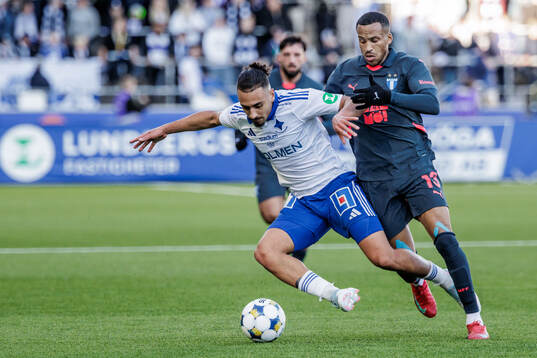 IFK Norrköpings Moutaz Neffati och Malmö FFs Martin Olsson