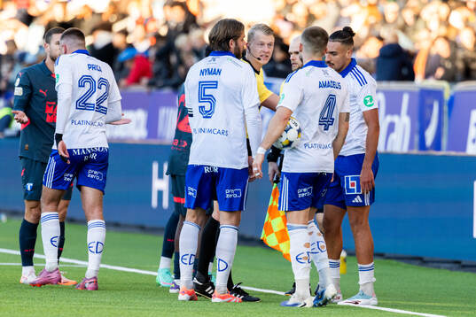 Domare Adam Ladebäck och IFK Norrköpings Christoffer