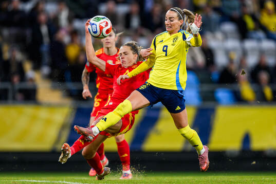 Irene Paredes of Spain and Kosovare Asllani of Sweden