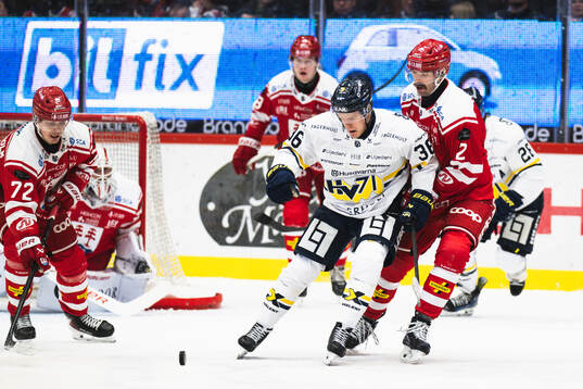 HV71s Martin Johnsen och Timrås Per Svensson