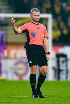 Domare Fredrik Klitte