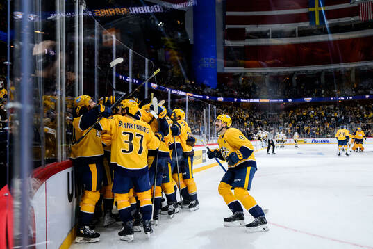 Filip Forsberg of Nashville Predators celebrate with team