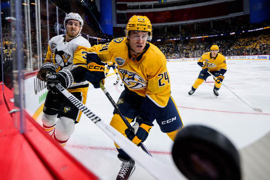 Anthony Mantha of Pittsburgh Penguins and Spencer Stastney