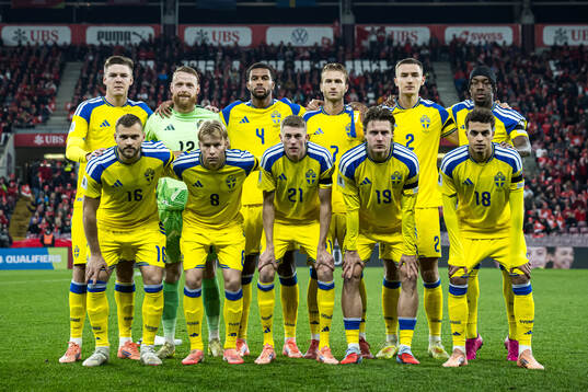 The starting eleven of Sweden pose for a team photo