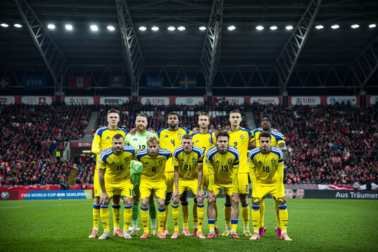 The starting eleven of Sweden pose for a team photo