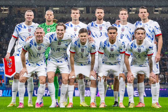 The starting eleven of Norway pose for a team photo