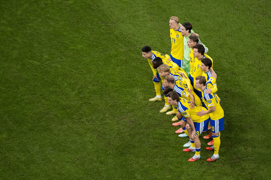 The starting eleven of Sweden pose for a team photo