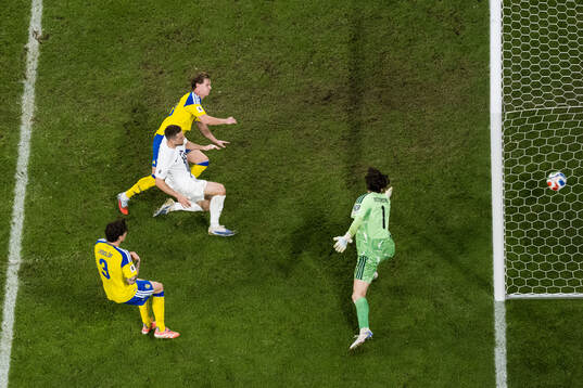 Timi Elsnik of Slovenia scores 0-1 behind Victor Nilsson