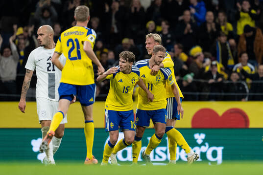 Gustav Lundgren of Sweden celebrates with Carl Starfelt and