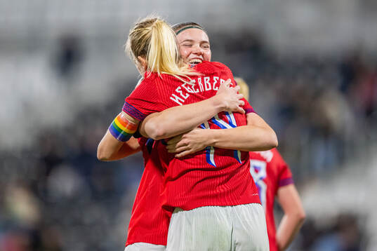 Signe Gaupset of Norway celebrates with teammate Ada