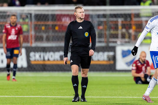 Domare Fredrik Klitte