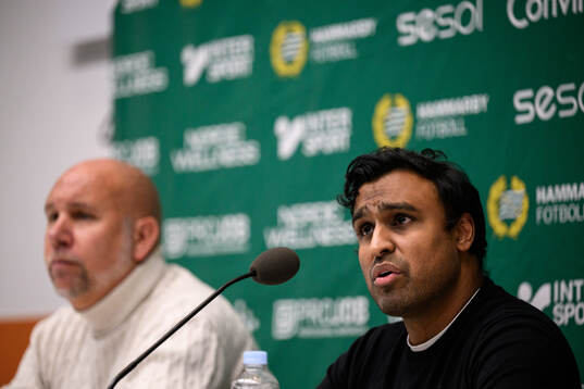 Kalle Karlsson och sportchef Mikael Hjelmberg