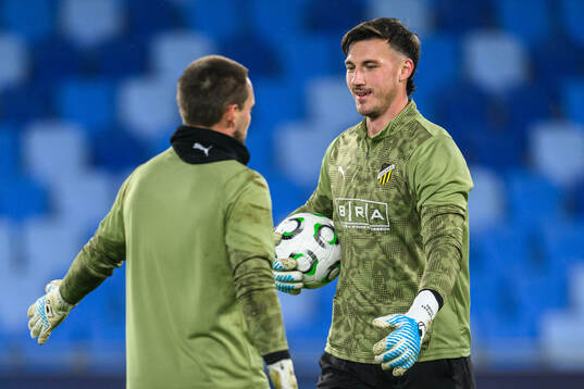 goalkeeper Oscar Jansson and goalkeeper Andreas Linde of