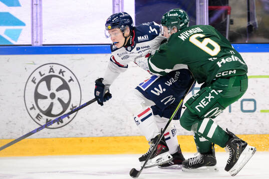 Linköpings Oliver Johansson och Färjestads Albert Wikman