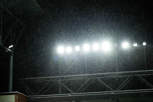 Arena belysning i snö