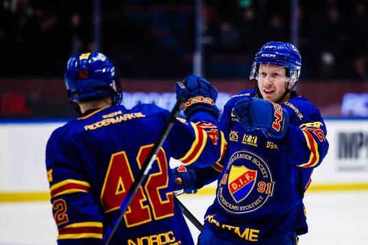 Djurgårdens Colby Sissons jublar med Marcus Nordmark