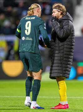 Erling Braut Haaland of Manchester City and Kasper Høgh of