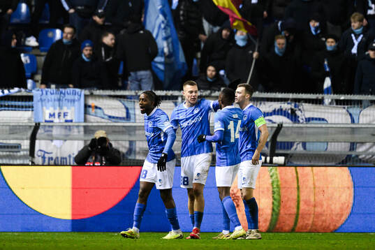 Players of KRC Genk celebrate
