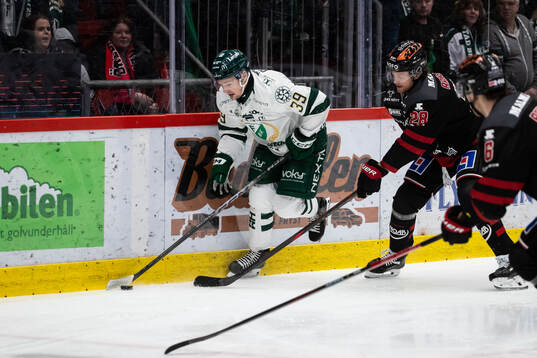 Färjestads Luke Philp och Örebros Linus Arnesson