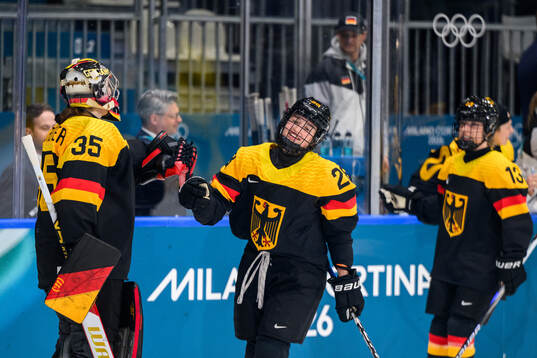 Katarina Jobst-Smith of Germany celebrates with goaltender