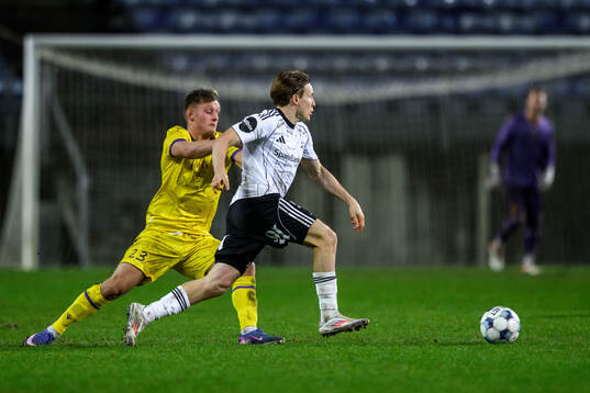Aki Samuelsen of Mjällby and Jonas Svensson of Rosenborg