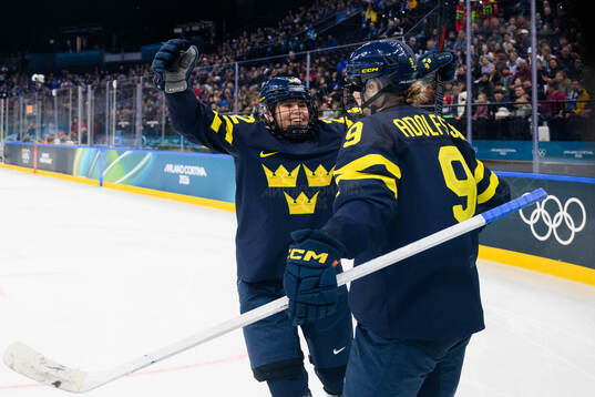 Hanna Thuvik and Jessica Adolfsson of Sweden celebrate the