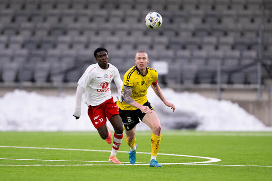Fredrikstads Daan Yoboue och Elfsborgs Thomas Isherwood