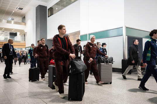 Nathan MacKinnon of Canada arrives