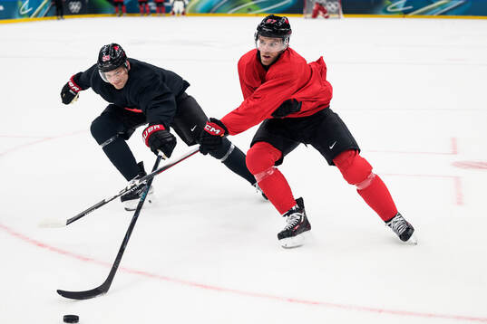 Cale Makar and Connor McDavid of Canada at an ice hockey