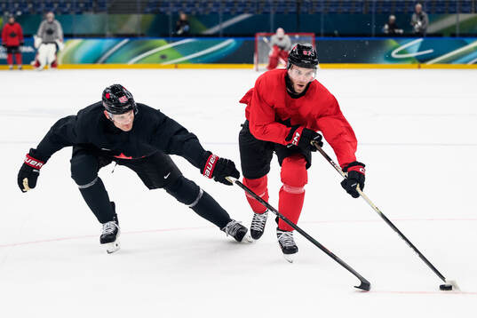 Cale Makar and Connor McDavid of Canada at an ice hockey