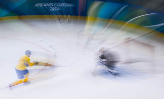 Hampus Lindholm and goaltender Jesper Wallstedt of Sweden