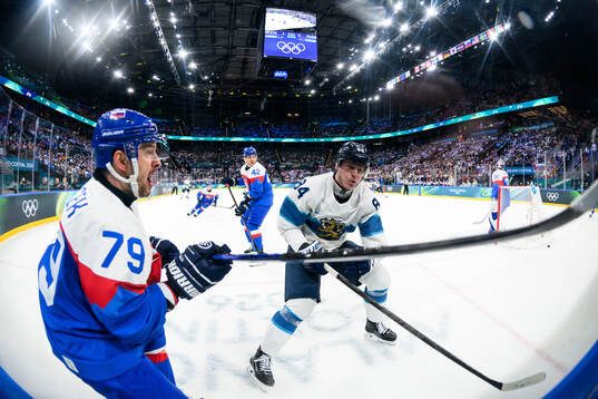 Libor Hudacek of Slovakia and Kaapo Kakko of Finland in the