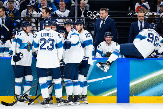 Kaapo Kakko and Head coach Antti Pennanen of Finland in the