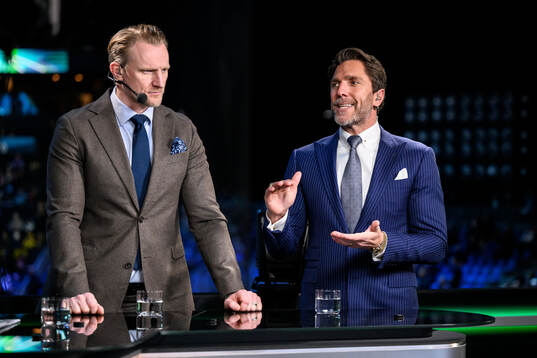 Staffan Kronwall and Henrik Lundqvist of Swedish
