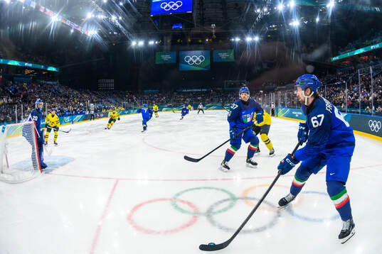 Mikael Frycklund of Italy in the men's ice hockey game