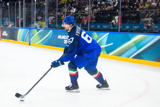 Mikael Frycklund of Italy in the men's ice hockey game