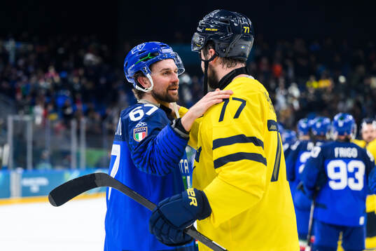 Mikael Frycklund of Italy and Victor Hedman of Sweden