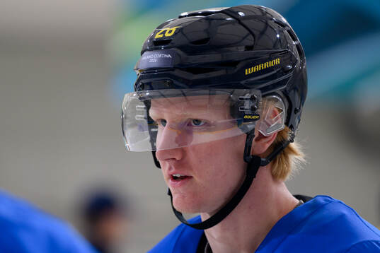 Rasmus Dahlin of Sweden at an ice hockey practice session