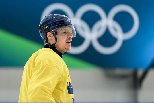 Hampus Lindholm of Sweden at an ice hockey practice session