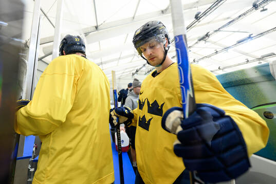 Elias Pettersson of Sweden leaves at an ice hockey practice