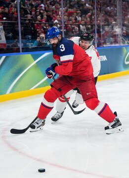 Sidney Crosby of Canada and Radko Gudas of Czech Replublic