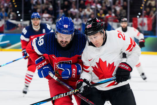 Tomas Hertl of Czech Replublic and Nathan MacKinnon of