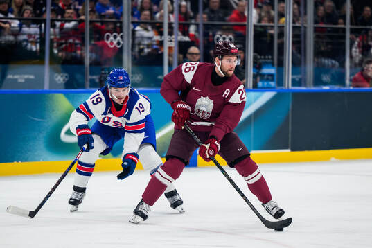 Matthew Tkachuk of USA and Uvis Janis Balinskis of Latvia
