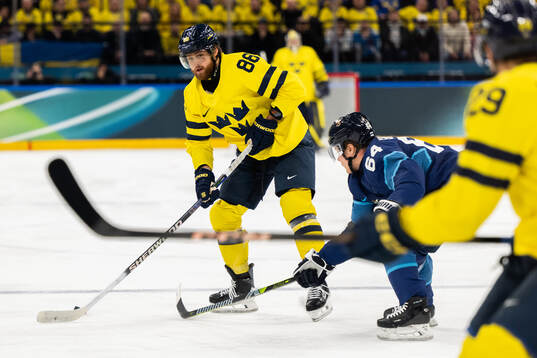 William Nylander of Sweden and Mikael Granlund of Finland