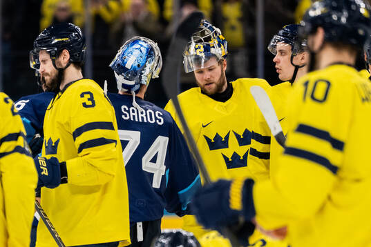 Goaltender Juuse Saros of Finland and goaltender Filip