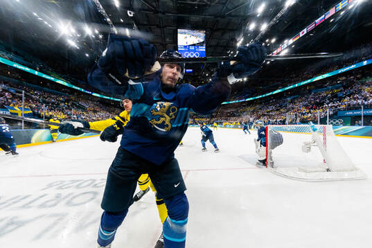 Rickard Rakell of Sweden and Esa Lindell of Finland in the