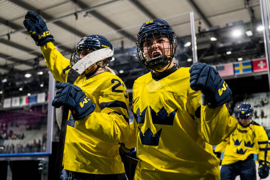 Thea Johansson and Nicole Hall of Sweden celebrate